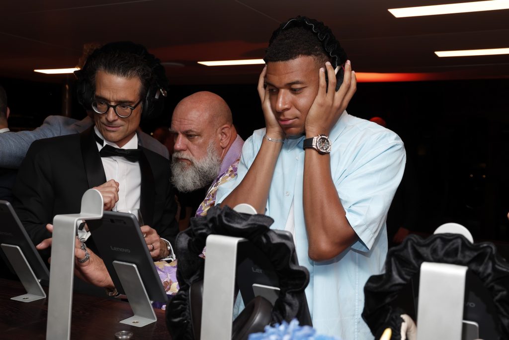 Kylian Mbappé (R) attends the LOEWE for Jacob & Co event